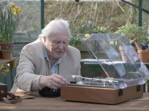 David Attenborough with a record player